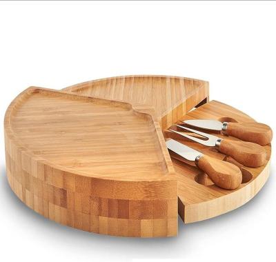 China Viable Custom Round Cheese Cutting Board Bamboo Cheese Board Pizza Cutting Board For Home Use for sale