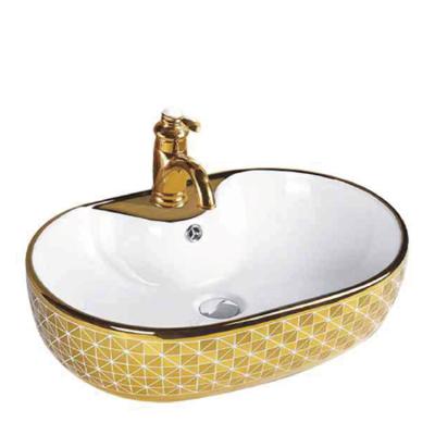 China Modern Design Easy Clean Sanitary Ware Counter Top Hand Basin Gold Toilet Oval Bathroom Sink for sale