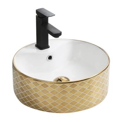 China Cheap Easy Clean Bathroom Sink Round Shape Counter Top Wash Basin Art Ceramic Gold Hand Basin for sale