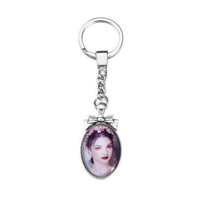 China Sublimation Fashionable High Quality Metal Glass Environmental Protection Design Fashion Key Chain for sale