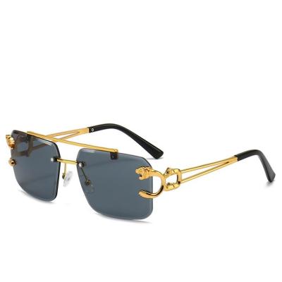 China Fashion Sunglasses 2022 Luxury brand rimless Gradient lens leopard sunglasses women men uv400 sun glasses for sale