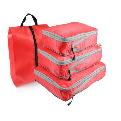 China Custom Durable Travel Packing Cubes Duffle 4pcs Storage Pouch Packing Cube Storage Bags Organizer Travel Luggage Set for sale