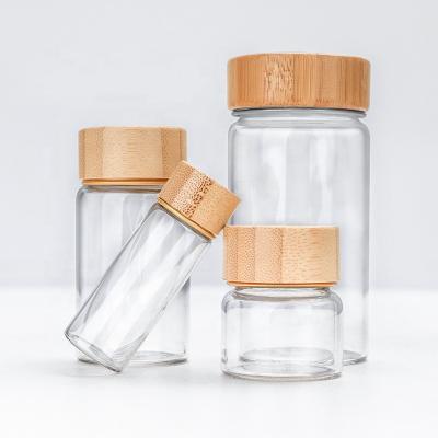 China CANDY Mini Bamboo Lid Glass Packaging Bottle 30ml 50ml 100ml 150ml Small Borosilicate Glass Bottle With Bamboo Lid for sale