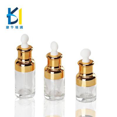 China New Style 30ml Clear Clear Essence Essential Oil Recyclable Material Glass Cosmetic Bottle With Gold Dropper Cap for sale