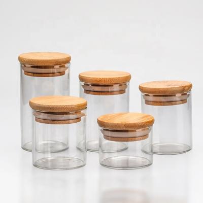 China Stocked luxury unique empty candle jars with wooden lids for sale