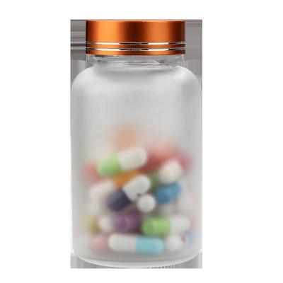 China Pharmaceutical Food Grade Empty Clear Frosted Glass Bottle Capsules 60ml 100ml Glass Pill Capsule Bottle for sale