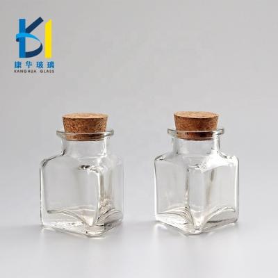 China Gift Glass Bottle Triangular Shaped Empty Bottles With Cork For Gift for sale