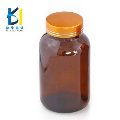 China Factory Wholesale Pharmaceutical 100ml Amber Medicine Vitamin Capsule Glass Bottle With Gold Cap for sale