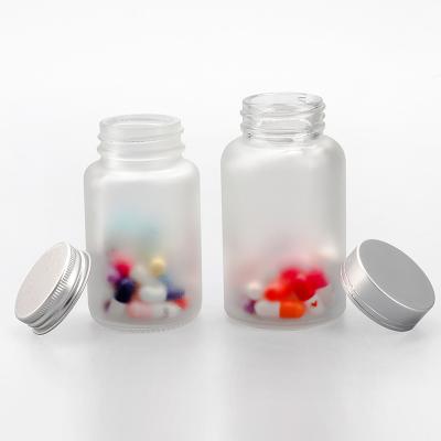 China Pill Custom Clear Frosted Empty Glass Medicine Pill Bottles Pill Bottle 100ml Pharmaceutical for sale