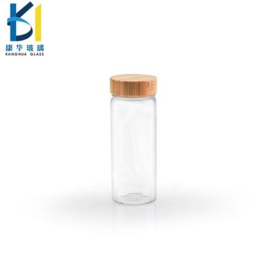 China Beverage Diameter 47 Mm 150ml Clear Tube Glass Bottle With Bamboo Lid for sale