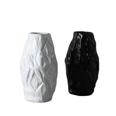 China Modern Nordic Black White Ceramic Crafts Ornaments Stone Solid Pattern Ceramic Vases With Artificial Plants for sale