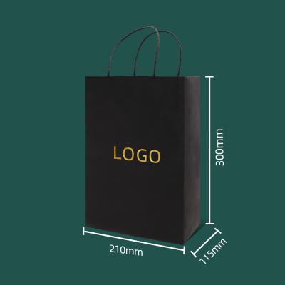 China Recycled Materials Sell New Customization Wholesale Gold Logo Hot Foiled Stamping Black Matt Kraft Gold Paper Bag With Cotton Rope Handles for sale