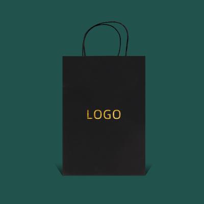 China Recycled Materials Wholesale New Logo Hot Foiled Stamping Black Matt Kraft Gold Paper Ziplock Bag for sale