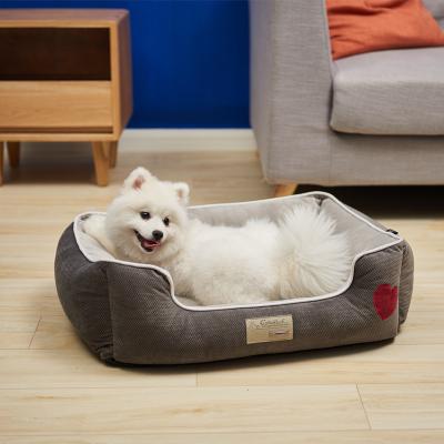 China Breathable Pet Cat Bed Washable Donut Cat and Dog PV Fur Round Cushion Pet Bed 65X50X20CM Heat Pet Beds for sale