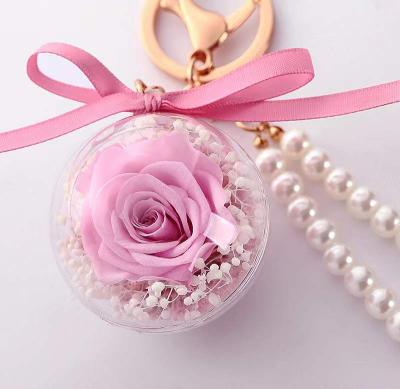 China Plastic Acrylic Ball Rose Flower Preserved Flower Keychain for Women Girls Car Hanging Valentine's Day Gift for sale