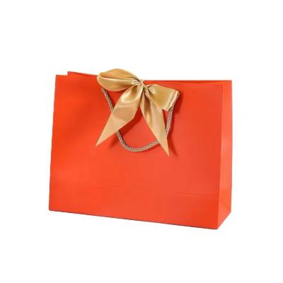 China Recycled Materials Gift Bag Recyclable Customized Paper Gift Bags Luxury Present Wedding Favors Birthday Party Bags Treat Boxes Bow Ribbon for sale