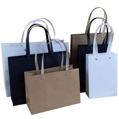 China Recycled Clothing Store Clothing Tote Bags Shopping Paper Bags Gift Materials Logo Kraft Paper Packaging Custom Printed for sale