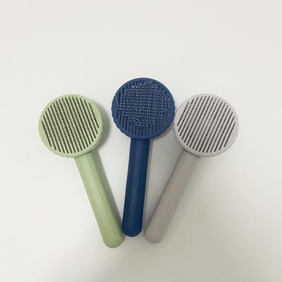 China Pet Hair Removal Brush Comb Pet Stored Hair Cleaning Renoval Pet Hair Brushes for sale