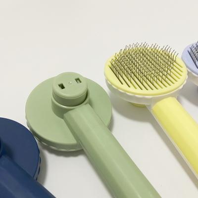 China Pet Hair Removal Brush Comb Pet Rake Comb Pet Stored Hair Brushes for sale