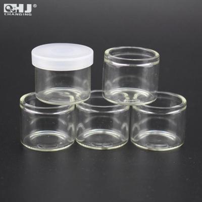 China Small 6ml Wholesale Clear Glass Jar Eco-friendly With Silicone Lid For Concentrate Storage Around No Neck Glass Jars for sale