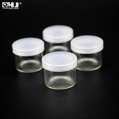 China Eco-friendly Cosmetics Cream Glass Round Empty Jars Body Scrub Container CR Lid Glass No Neck CR Jar for sale