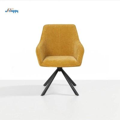 China Elegant Yellow Rotating Dining Chair with Fabric Cover and Iron Frame Modern Style for sale