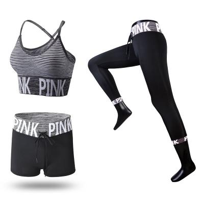 China Breathable Wholesale Yoga Suit Women Removable Chest Padded Sports Bra And Pants Two Piece for sale