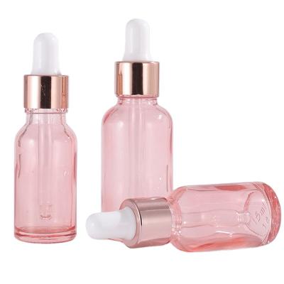 China 5ml 10ml 15ml 20ml 30ml 50ml 100ml Serum Liquid Glass Bottle Empty Essential Oil Cosmetic Pink Bottles With Rose Gold Dropper Pipette for sale