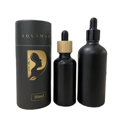 China Hot Sale Cosmetic Essential Oil Packaging Empty Classic Shape Portable Bottle Matte Black Glass Dropper Bottle Custom Hair Oil Serum for sale