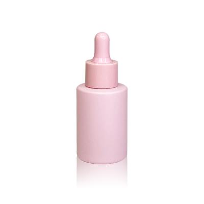 China Wholesale Cosmetic Essential Oil Bottle Packaging 30ml Skin Care Empty Pink Glass Essential Oil Dropper Bottle for sale