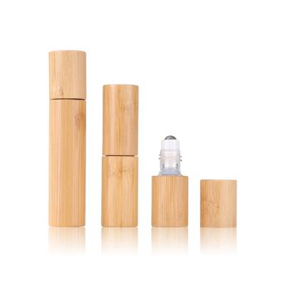 China Cosmetics 3ml 5ml 10ml Empty Glass Roll On Bottle Essential Oil Perfume Bamboo Wooden Roll On Refillable Bottle for sale