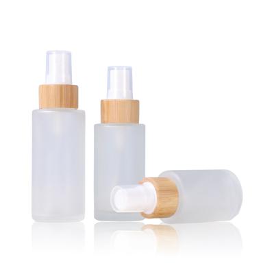 China Cosmetic In Stock Empty Cosmetic Packaging 20ML 30ML 50ML 60ML 100ML 120ML Clear Frosted Glass Bottle With Bamboo Spray Cap for sale