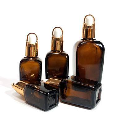 China 15ml cosmetic 25ml 35ml 55ml 100ml Amber Square Glass Bottle Dropper for essential oil bottles for sale