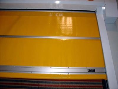 China Custom Automatic Durable PVC High Speed Rolling Shutter Doors in Yellow Color for sale