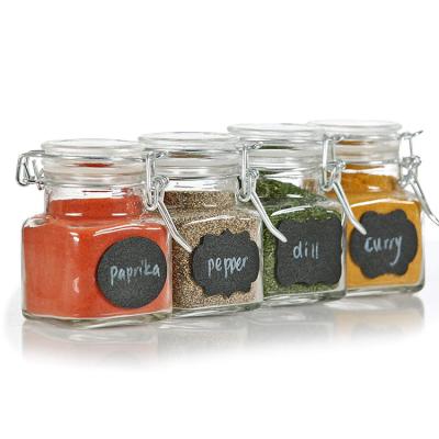 China Viable Empty Square Kitchen Ginger Salt Pepper Container 4oz Clear Glass Spice And Jars Jars With Flip Top Lids for sale