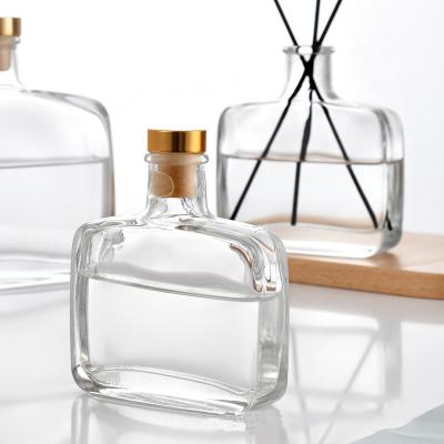 China Personal Care 200ml 330ml Cute Empty Transparent Perfume Luxury Flat Diffuser Glass Bottle With Cork For Reed Diffuser for sale