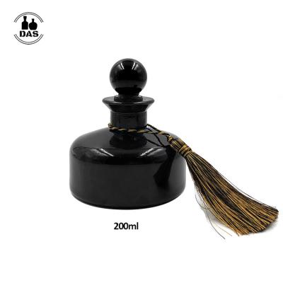 China Custom Luxury 200ml Empty Home Personal Care Round Perfume Black Reed Diffuser Glass Bottle With Diffuser Lids For Diffuser for sale