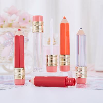 China Hot Sale 5ml Mini Pencil Shaped Empty Plastic Cosmetic Lip Gloss Container Tube With Magic Wand Brush for sale