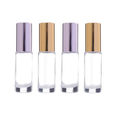 China 100 Pieces/lot 4ml New Style Cosmetic Hot Selling Portable Transparent Roll Ball Perfume Bottle for sale