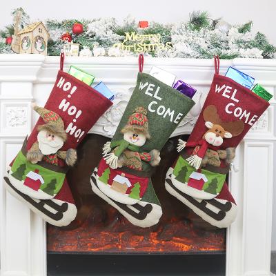 China Nonwoven fabric +plush Christmas tree hanging ornaments nonwoven fabric plush gift bags Christmas stocking sock for Christmas party for sale