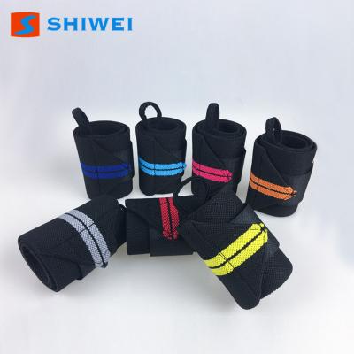 China SHIWEI-HW004#Free Sample Universal Wrist Support Weightlifting Wrist Strap Wraps for sale