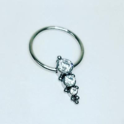 China ASTM F136 Titanium Beaded High Fashion CBR Jewelry Captive Ring With Bezel Set 3 CZ Gem Cluster for sale