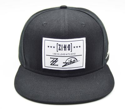 China COMMON Custom Private Label Covers Front Snapback Hat Woven Label for sale