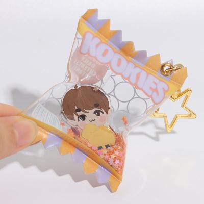 China Gift No MOQ Anime Candy Key Chain Custom Shaker Charms Inner Acrylic Candy Bag Key Chain As A Gift for sale