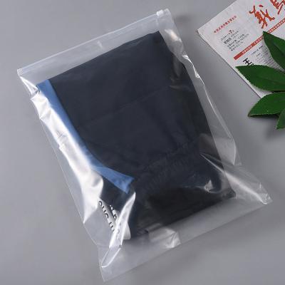 China Safety Fashion Eco Friendly Making Machine Small 1.5cm Logo Clothing Pvc Custom Mini And Handle Seal Cloth Plastic Ziplock Bag for sale