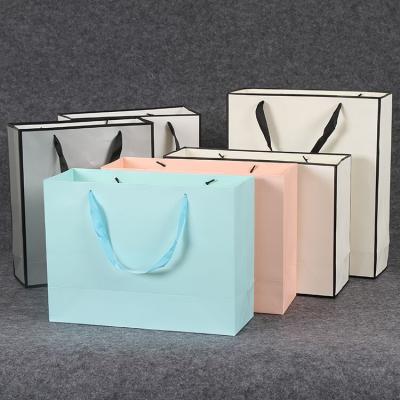 China Portable Creative Gifts Handmade Cosmetics Honey Shoe Store Clothing Liquor Tea Liquor Packaging Shopping Paper Bags for sale