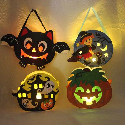 China Handmade Halloween Hand-carry Kindergarten Praying DIY Material Sugar Kids Candy Witch Pumpkin Lantern Package for sale