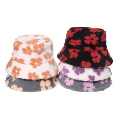 China 2021 Winter Flower Pot Hat COMMON Net Red Printing Student Hat Lamb Hair Flower Warm Fisherman Hat for sale