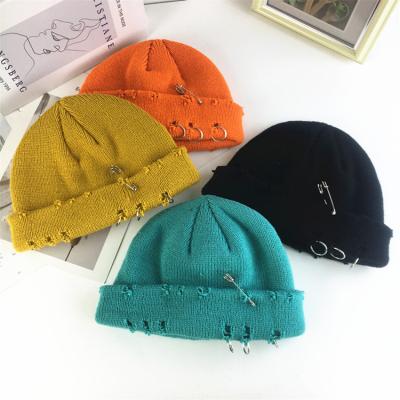 China 2021 Japanese COMMON trend hole retro knit Korean winter pin circle hat hip hop street beanie wool hat for sale