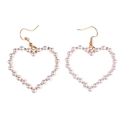 China Hot Wholesale Romantic Fashion Korean Cute YiYi Bead Lovers Circle Earrings Elegant Pretty For Women for sale